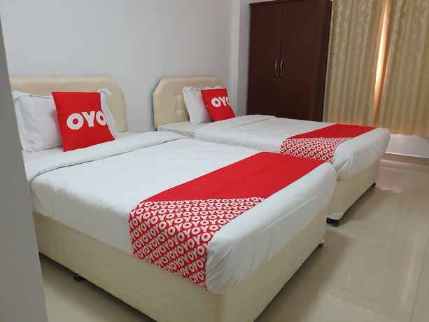 Imagen de la habitación del Hotel OYO 104 Loban Apartment. Foto 9