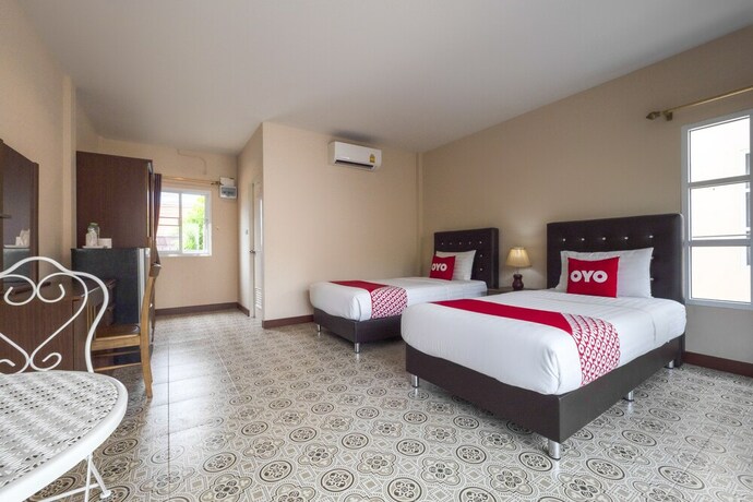 Imagen de la habitación del Hotel OYO 1048 Home And Garden Resort. Foto 15