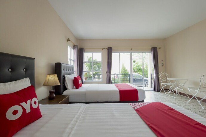 Imagen de la habitación del Hotel OYO 1048 Home And Garden Resort. Foto 16