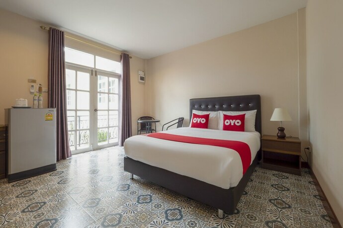 Imagen de la habitación del Hotel OYO 1048 Home And Garden Resort. Foto 17