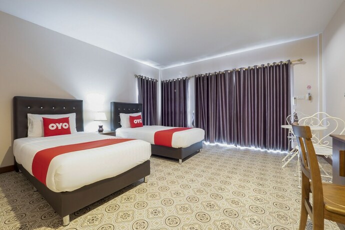 Imagen de la habitación del Hotel OYO 1048 Home And Garden Resort. Foto 18