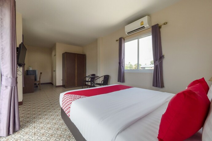 Imagen de la habitación del Hotel OYO 1048 Home And Garden Resort. Foto 24