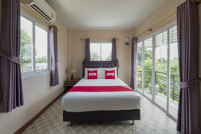 Imagen de la habitación del Hotel OYO 1048 Home And Garden Resort. Foto 26