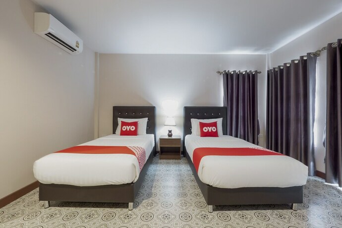 Imagen de la habitación del Hotel OYO 1048 Home And Garden Resort. Foto 29