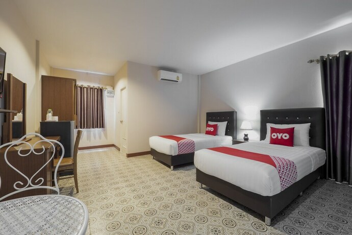 Imagen de la habitación del Hotel OYO 1048 Home And Garden Resort. Foto 30