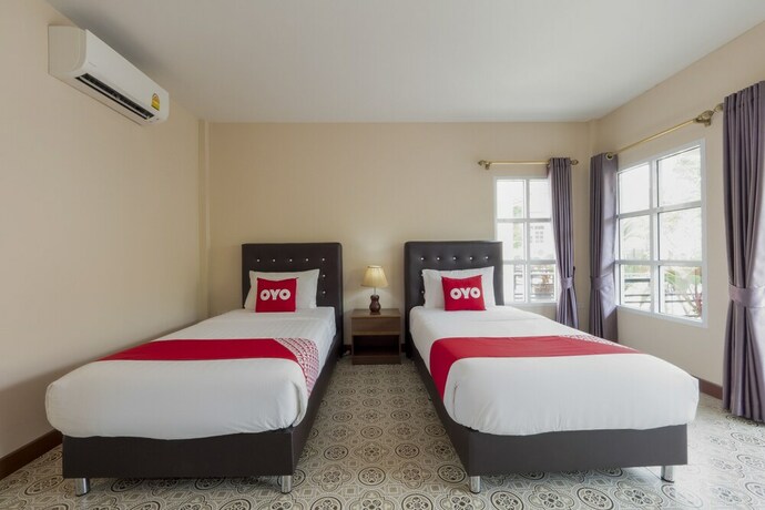 Imagen de la habitación del Hotel OYO 1048 Home And Garden Resort. Foto 31