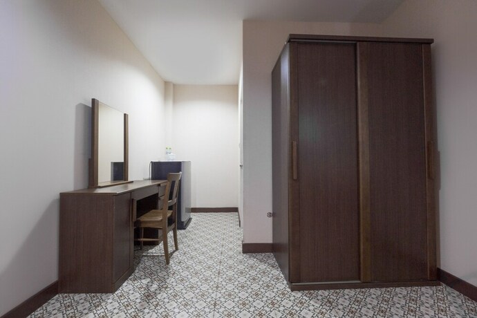 Imagen de la habitación del Hotel OYO 1048 Home And Garden Resort. Foto 32