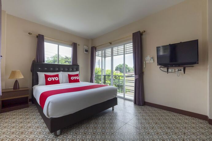 Imagen de la habitación del Hotel OYO 1048 Home And Garden Resort. Foto 36