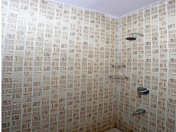 Imagen de la habitación del Hotel OYO 10592 Ganga Palace. Foto 5