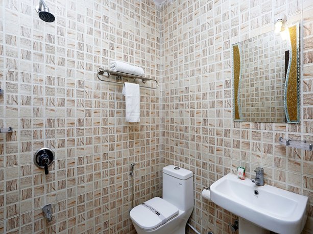 Imagen de la habitación del Hotel OYO 10592 Ganga Palace. Foto 7