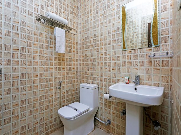 Imagen de la habitación del Hotel OYO 10592 Ganga Palace. Foto 8