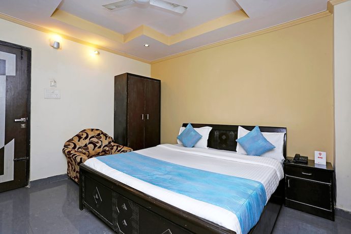 Imagen de la habitación del Hotel OYO 10592 Ganga Palace. Foto 10