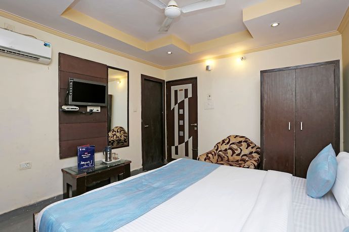 Imagen de la habitación del Hotel OYO 10592 Ganga Palace. Foto 11