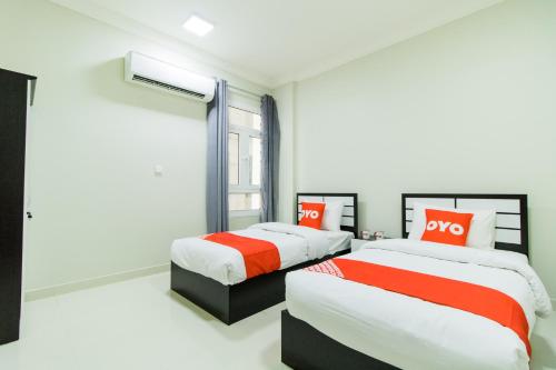 Imagen de la habitación del Hotel OYO 106 Muscat Grand Hotel Apartment. Foto 8
