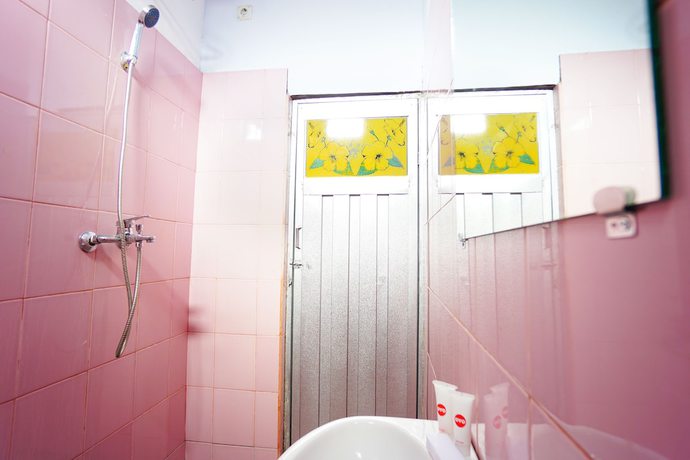 Imagen de la habitación del Hotel OYO 1064 Manado Airport Homestay. Foto 8