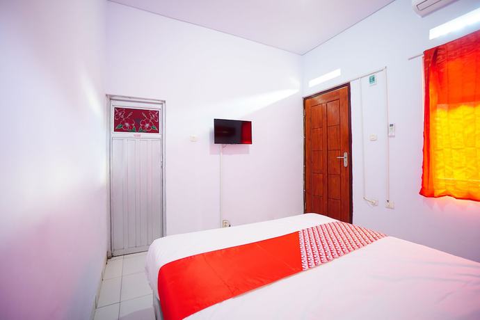 Imagen de la habitación del Hotel OYO 1064 Manado Airport Homestay. Foto 9