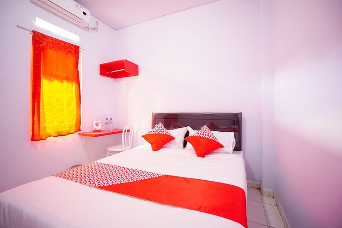 Imagen de la habitación del Hotel OYO 1064 Manado Airport Homestay. Foto 10
