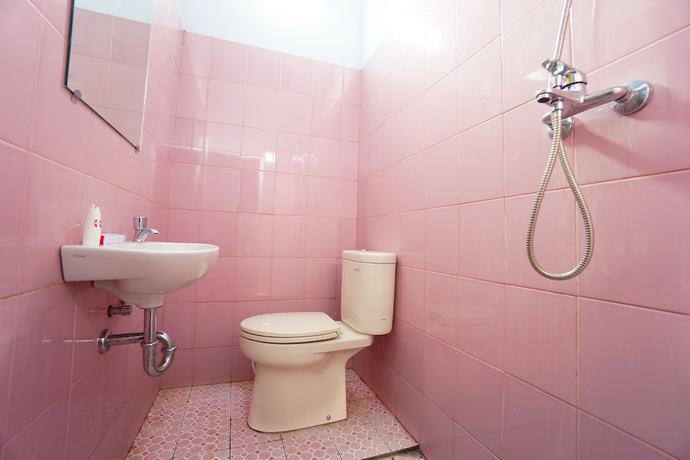 Imagen de la habitación del Hotel OYO 1064 Manado Airport Homestay. Foto 12