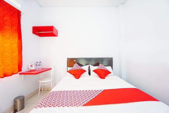 Imagen de la habitación del Hotel OYO 1064 Manado Airport Homestay. Foto 13