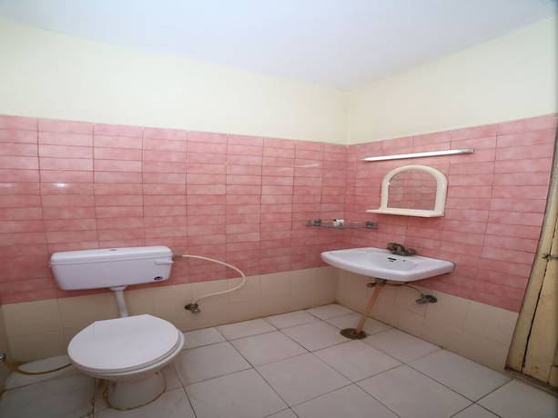 Imagen de la habitación del Hotel OYO 1067 Surbhi. Foto 5