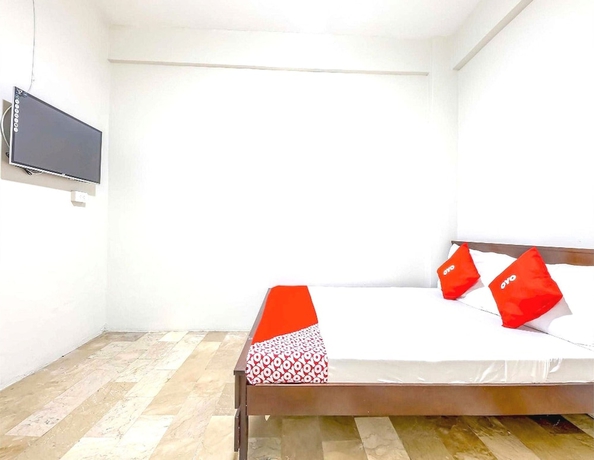 Imagen de la habitación del Hotel OYO 1069 Cittatel Inn. Foto 7