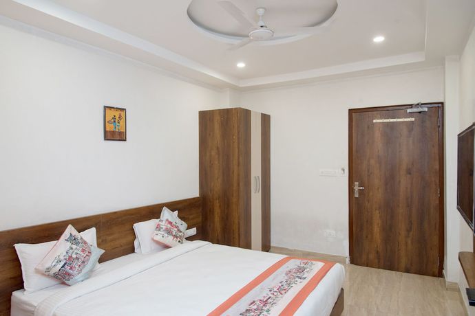 Imagen de la habitación del Hotel OYO 10893 Divine Inn. Foto 6