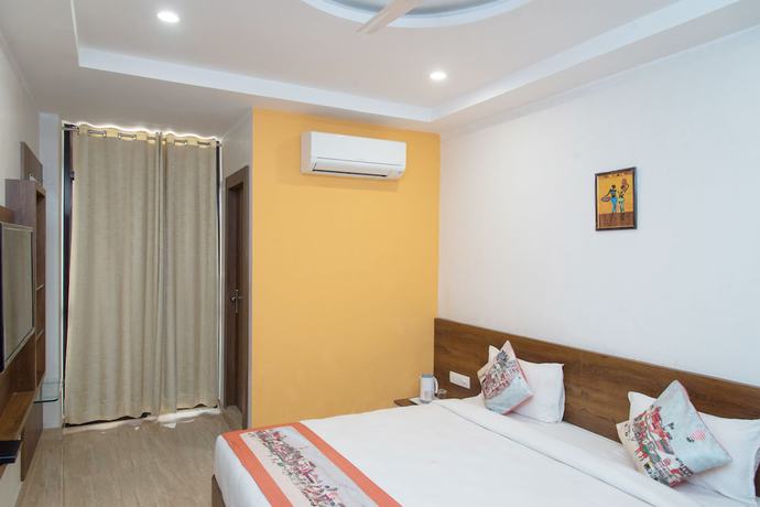Imagen de la habitación del Hotel OYO 10893 Divine Inn. Foto 9
