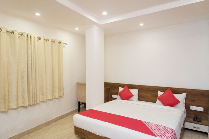 Imagen de la habitación del Hotel OYO 10893 Divine Inn. Foto 10