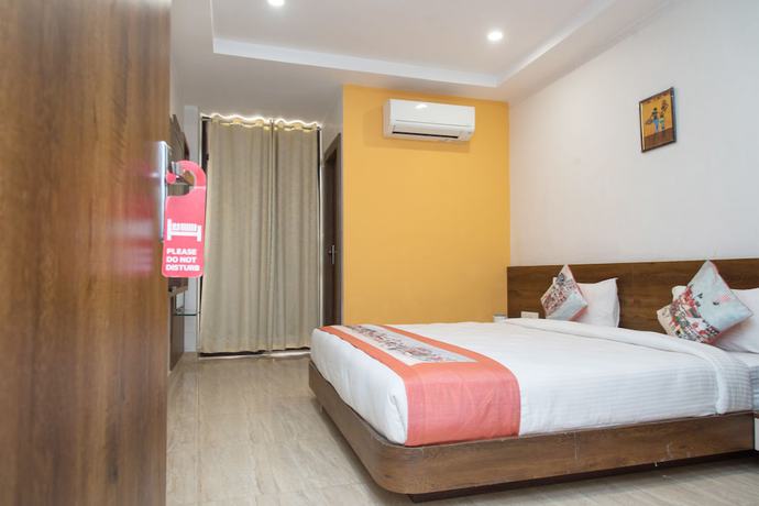 Imagen de la habitación del Hotel OYO 10893 Divine Inn. Foto 11