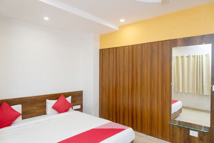 Imagen de la habitación del Hotel OYO 10893 Divine Inn. Foto 13