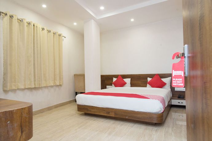 Imagen de la habitación del Hotel OYO 10893 Divine Inn. Foto 14