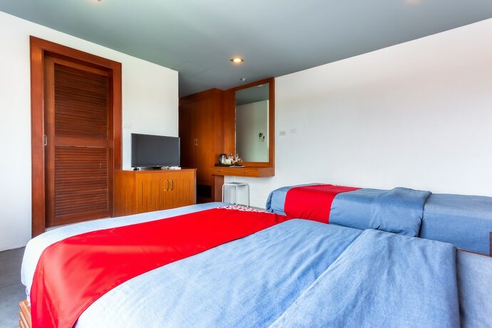 Imagen de la habitación del Hotel OYO 1093 De Nawarat Chiang Mai Boutique Apartment. Foto 11