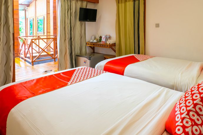 Imagen de la habitación del Hotel OYO 1099 Bandini Riverside Cottage. Foto 8