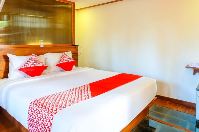 Imagen de la habitación del Hotel OYO 1099 Bandini Riverside Cottage. Foto 10