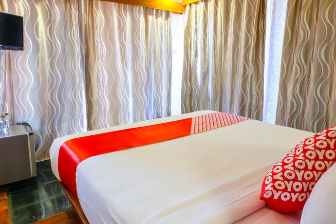 Imagen de la habitación del Hotel OYO 1099 Bandini Riverside Cottage. Foto 11