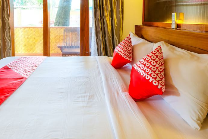 Imagen de la habitación del Hotel OYO 1099 Bandini Riverside Cottage. Foto 14