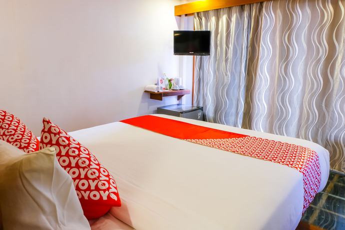 Imagen de la habitación del Hotel OYO 1099 Bandini Riverside Cottage. Foto 15