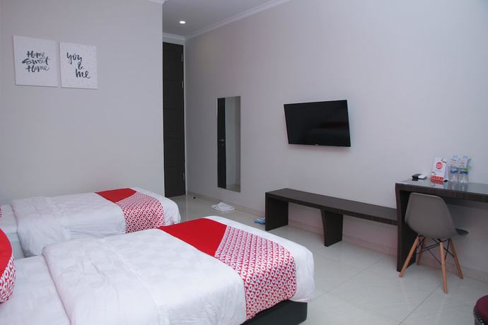 Imagen de la habitación del Hotel OYO 1100 Galaxy Guesthouse. Foto 3
