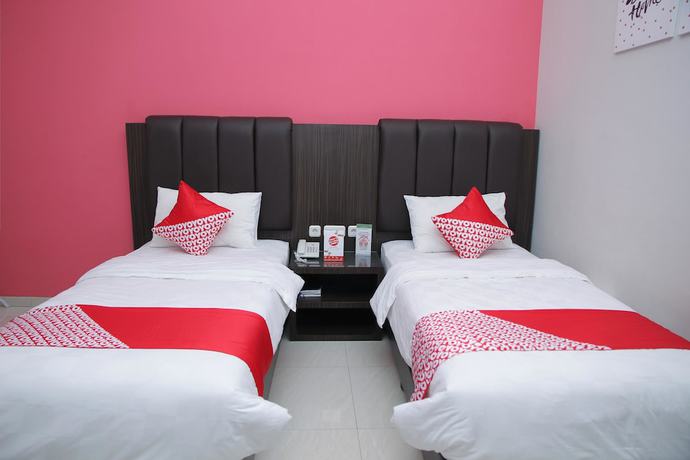 Imagen de la habitación del Hotel OYO 1100 Galaxy Guesthouse. Foto 6