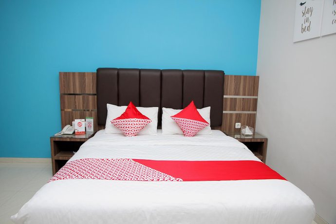 Imagen de la habitación del Hotel OYO 1100 Galaxy Guesthouse. Foto 9