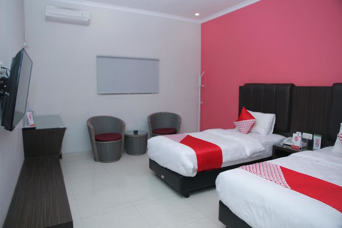 Imagen de la habitación del Hotel OYO 1100 Galaxy Guesthouse. Foto 10