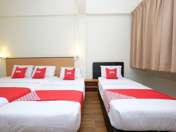 Imagen de la habitación del Hotel OYO 1105 Hotel 75. Foto 2