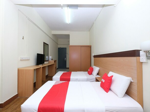 Imagen de la habitación del Hotel OYO 1105 Hotel 75. Foto 3