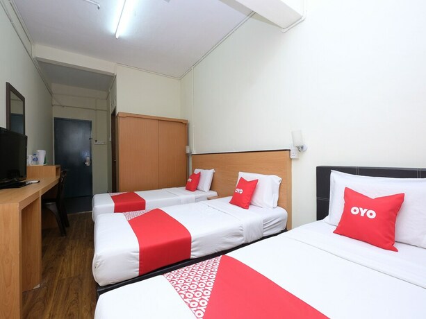 Imagen de la habitación del Hotel OYO 1105 Hotel 75. Foto 4