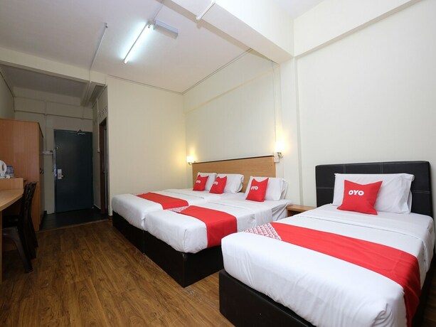 Imagen de la habitación del Hotel OYO 1105 Hotel 75. Foto 6