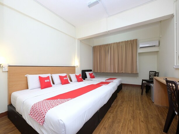 Imagen de la habitación del Hotel OYO 1105 Hotel 75. Foto 9