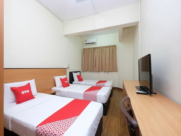 Imagen de la habitación del Hotel OYO 1105 Hotel 75. Foto 10