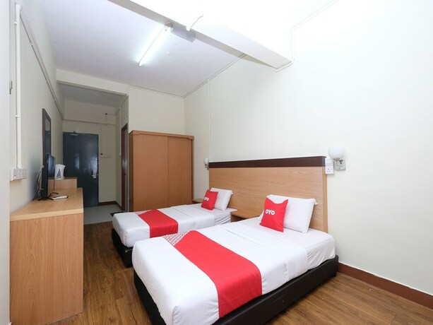 Imagen de la habitación del Hotel OYO 1105 Hotel 75. Foto 11