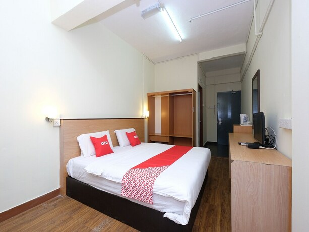 Imagen de la habitación del Hotel OYO 1105 Hotel 75. Foto 13