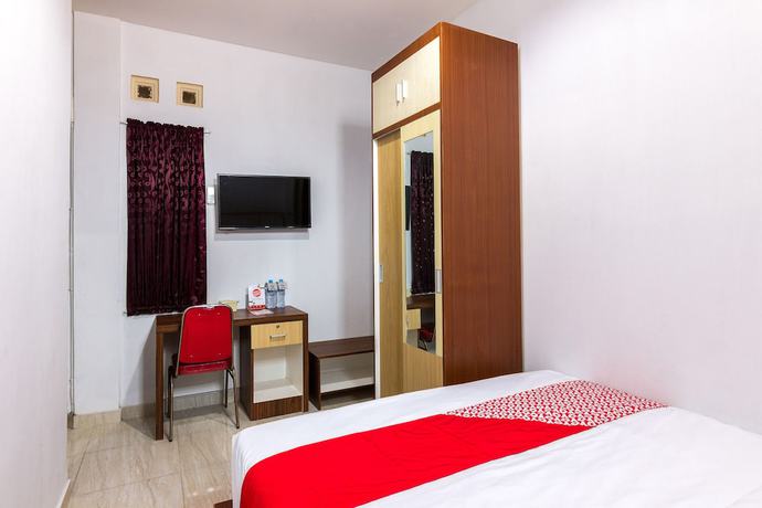 Imagen de la habitación del Hotel OYO 1118 Artomoro Family Guesthouse. Foto 2
